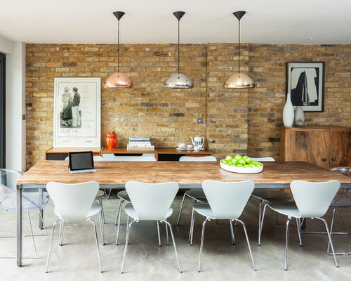 Pendant Light Dining Room Trendy great room photo in London with concrete floors