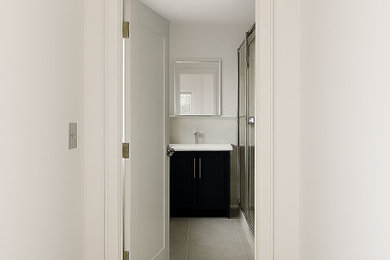 Example of a minimalist hallway design in Surrey