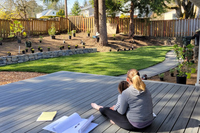Photo of a large traditional drought-tolerant and partial sun backyard outdoor playset in Portland with decking for summer.