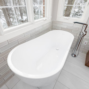 Modern Luxe Retreat: Walnut Vanity and Black Tile Bathroom Renovation