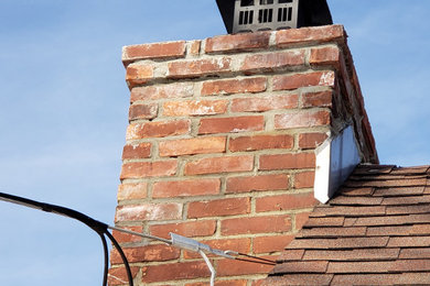 Chimney flashing not properly installed, may allow water in