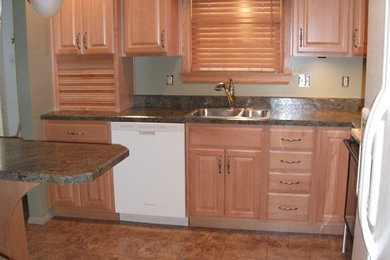 Elegant multicolored floor kitchen photo in Other with white appliances