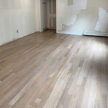 EAST QUOGUE: 4" SELECT WHITE OAK INSTALLED & FINISHED WITH CUSTOM GRAY STAIN