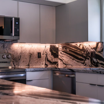 Matte Ivory Kitchen Remodel with Leathered Granite in Ahwautukee, AZ