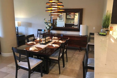 Example of a transitional dining room design in Tampa