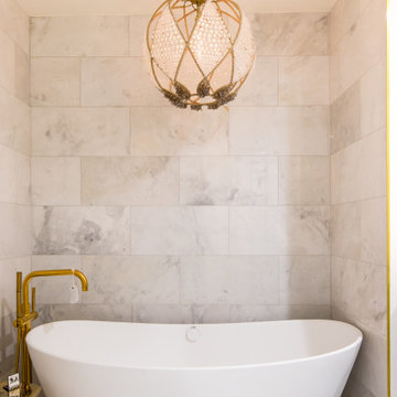 Freestanding Tub surrounded by Large Beautiful Marble Tiles, Deco Glam Chandelie