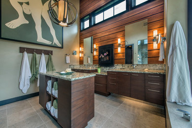 Large trendy master ceramic tile drop-in bathtub photo in Denver with flat-panel cabinets, dark wood cabinets, beige walls, an undermount sink and granite countertops