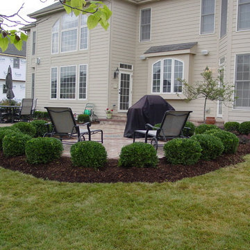 Formal paver patio gardens