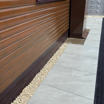 Porcelain Path Down the Side of a Timber Clad Lodge