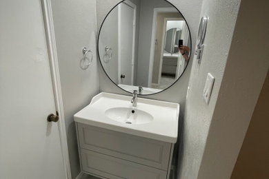 Inspiration for a contemporary powder room remodel in Dallas