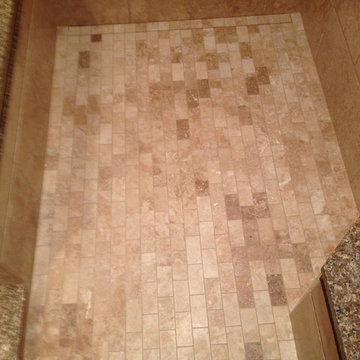 Custom Travertine shower with Schluter Line Drain