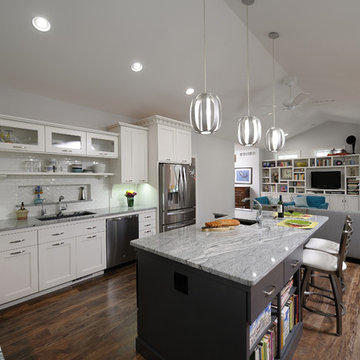Kitchen view into great room and fireplace