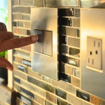 adorne® Half-Size Paddle Switches and adorne® Tamper-Resistant Outlet in White