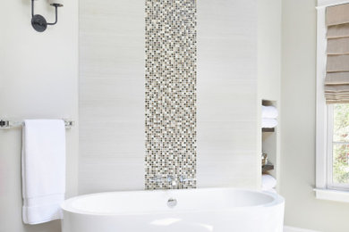 Example of a large transitional master beige floor freestanding bathtub design in Atlanta with beige walls
