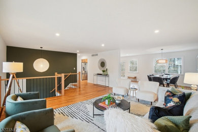 Example of a transitional living room design in New York