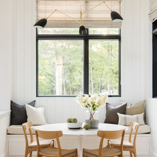 Dining room - mid-sized farmhouse light wood floor and beige floor dining room idea in Salt Lake City with white walls