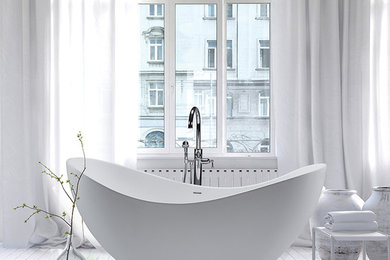 Freestanding bathtub - large contemporary master light wood floor and white floor freestanding bathtub idea in Denver with open cabinets, white cabinets and white walls