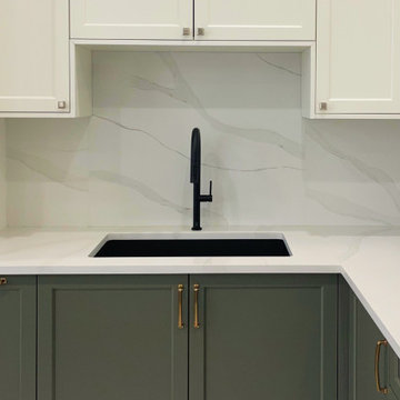 Bespoke Sage Green Transitional Kitchen Showroom - Greater Vancouver