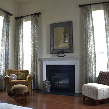 Two Story Drapes with Decorative Wood Poles