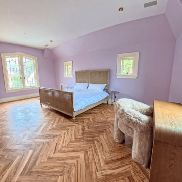 Custom Luxury Bedroom with Artistic Design and Herringbone Flooring