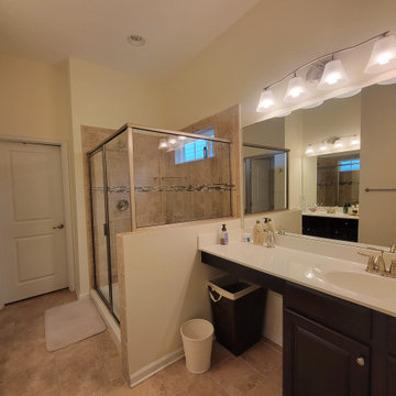 Primary Before: Bathroom with Glass-Enclosed Shower and Double Vanity