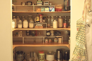 This is an example of a country kitchen pantry in New York.