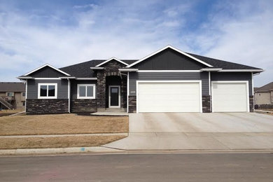 Example of an arts and crafts exterior home design in Other