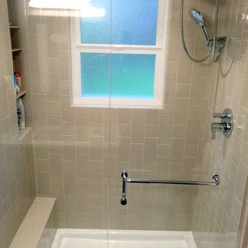 Vertical two size subway tile walk in shower