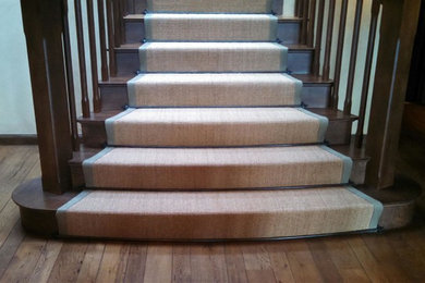 Example of a classic wooden straight staircase design in Denver
