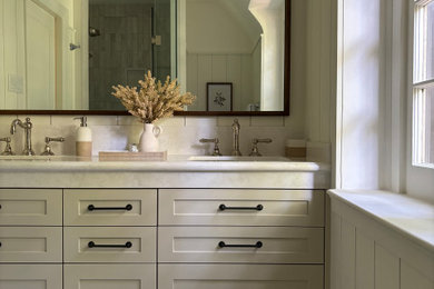 Bathroom - transitional beige floor and double-sink bathroom idea in Toronto with shaker cabinets, beige cabinets, beige walls, an undermount sink, white countertops and a built-in vanity