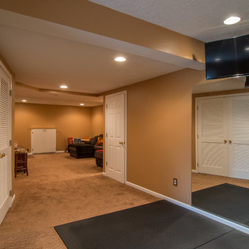 Finished basement with exercise area and small bath in Wexford, PA