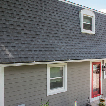 Naperville home with renovated exterior and gambrel roof.