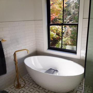 Luxury onsuite guest bathroom with NuHeat heated floor.
