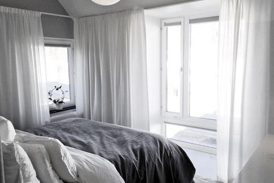 This is an example of a scandinavian bedroom in Stockholm.