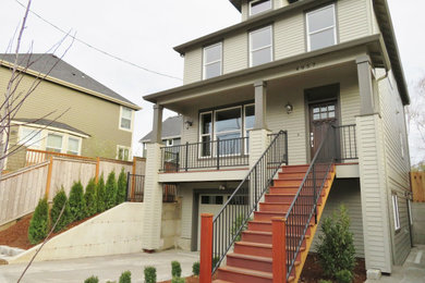 Example of a mid-sized arts and crafts kitchen design in Portland with granite countertops and two islands