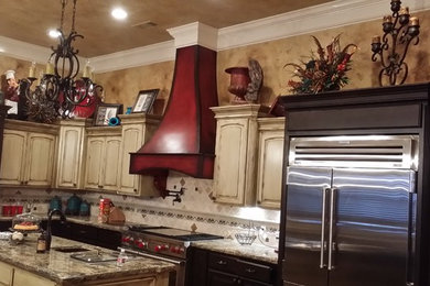Kitchen - rustic kitchen idea in Austin