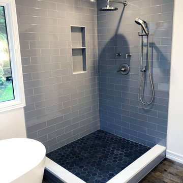 Bathroom remodel with gray subway and hexagon tile