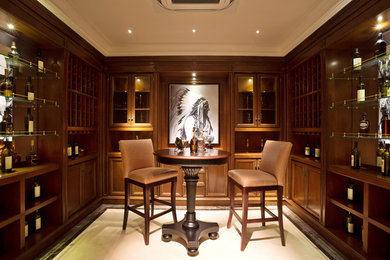 Large arts and crafts u-shaped white floor seated home bar photo in Chicago with dark wood cabinets, raised-panel cabinets, wood countertops and mirror backsplash