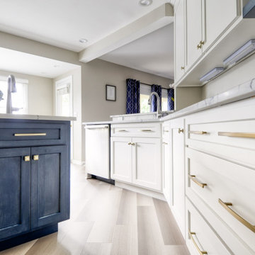 Navy Stained Island, Hood vent and Floating Shelves in White Shaker Kitchen