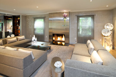 Design ideas for a large contemporary open concept living room in New York with grey walls, carpet, a ribbon fireplace, a metal fireplace surround and a built-in media wall.