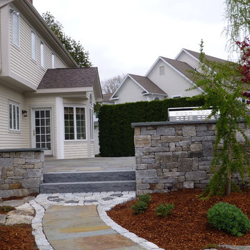 Bluestone Patio with Granite Cobblestone walls