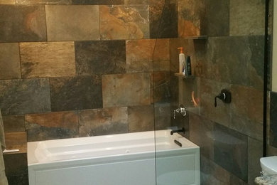 Mid-sized mountain style multicolored tile and porcelain tile porcelain tile bathroom photo in Seattle