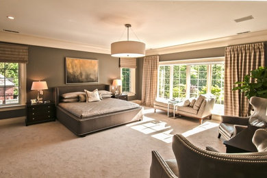 Example of a large transitional master carpeted and beige floor bedroom design in Indianapolis with gray walls