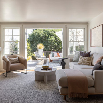 Modern Living Room with Cream Sectional and Patio Access