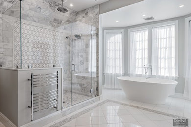 Example of a large classic master white tile and stone tile mosaic tile floor and white floor bathroom design in Boston with raised-panel cabinets, gray cabinets, a two-piece toilet, gray walls, an undermount sink, quartz countertops and a hinged shower door