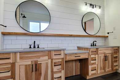 Cottage master white tile and subway tile porcelain tile, black floor, double-sink and shiplap wall bathroom photo in Edmonton with beaded inset cabinets, medium tone wood cabinets, white walls, an undermount sink, quartz countertops, gray countertops and a built-in vanity