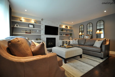 Example of a trendy family room design in Toronto