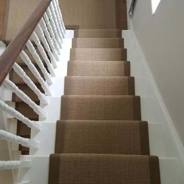 Brown Carpet with Brown Edgings Installed to Stairs