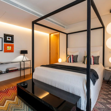 Bedroom with Black Four-Poster Bed and Art Wall, Lisbon