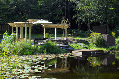 Design ideas for a farmhouse landscaping in New York.